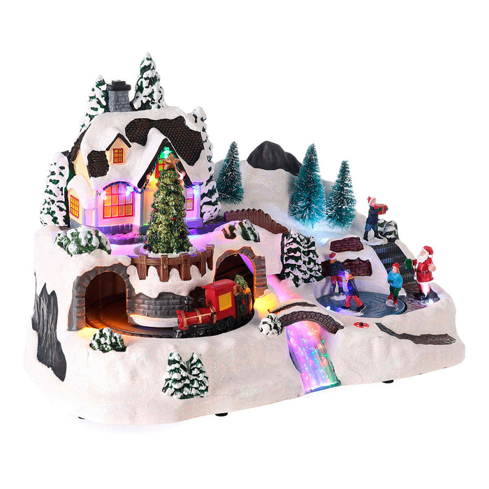 Pueblo navideño decorativo con escena en movimiento LED 37x22cm