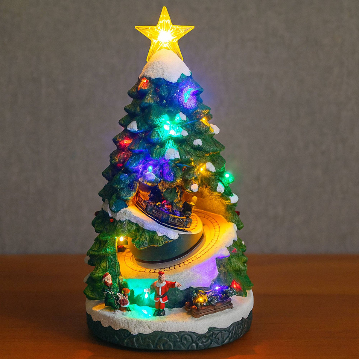 Árbol navideño decorativo con luces LED y movimiento 21x22x38cm (4)