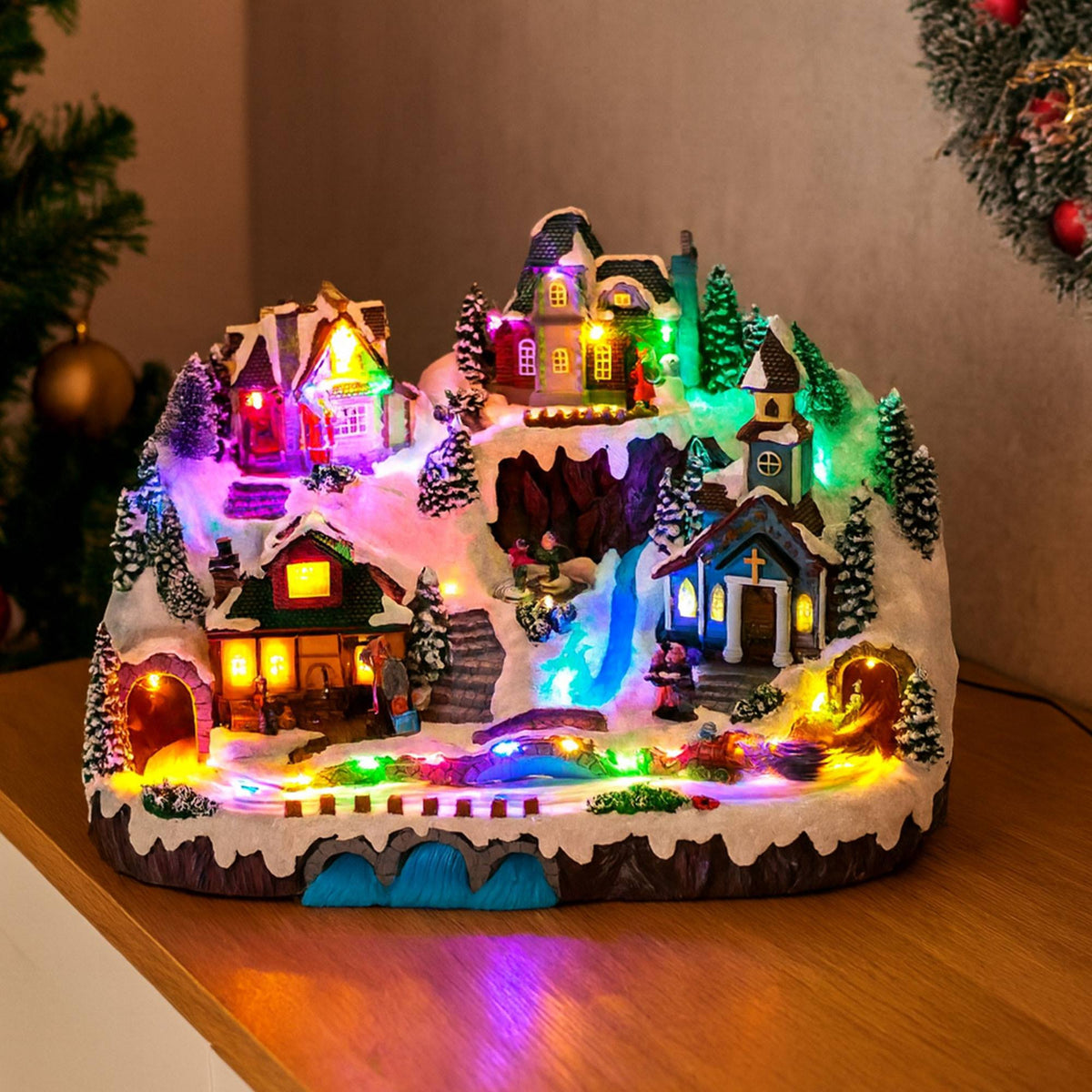 Escena de aldea navideña con luces LED y movimiento 41x27x27cm (4)