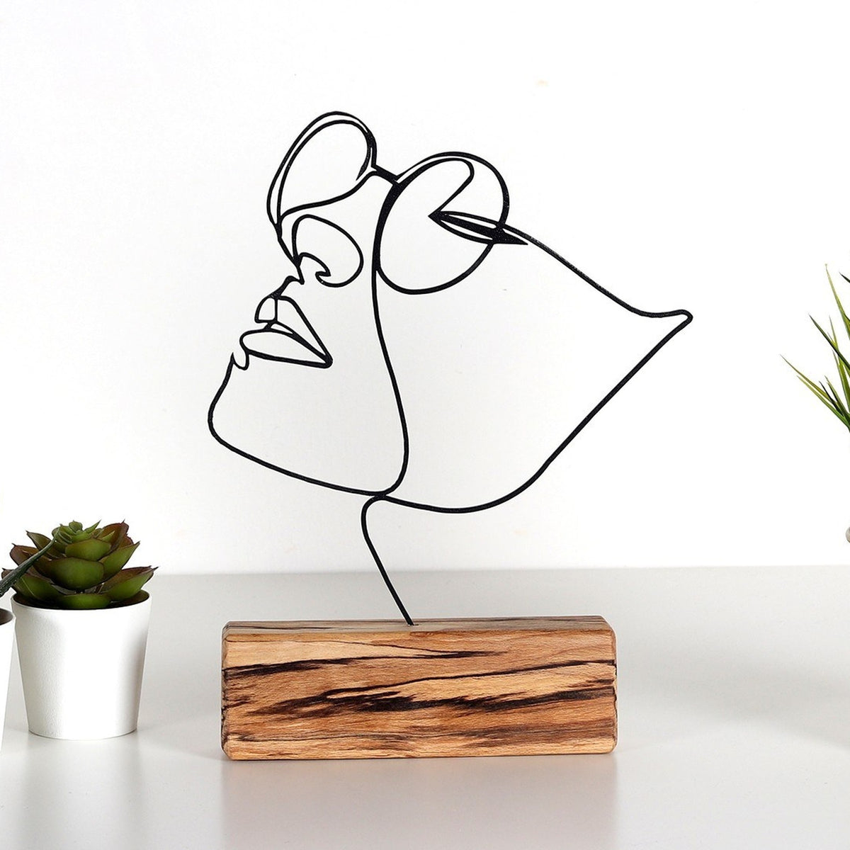 Objeto decorativo representación facial (2)