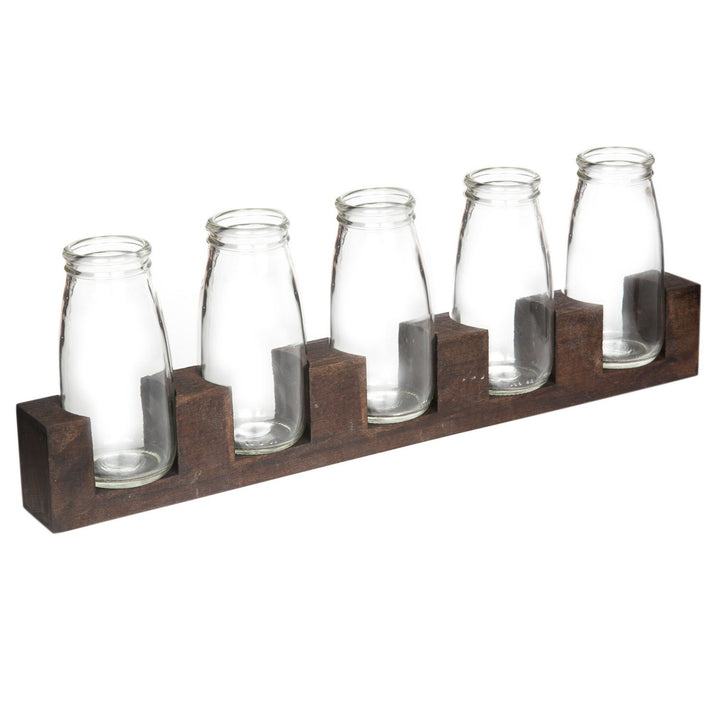 Florero elegante compuesto por botellas decorativo