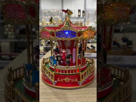 Vídeo del producto Carrusel navideño LED con música y movimiento 23,2x23,2x28,3cm