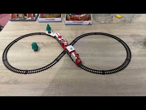 Vídeo del producto Tren de Navidad 22 pzs con sonido y luz, vía de 283cm